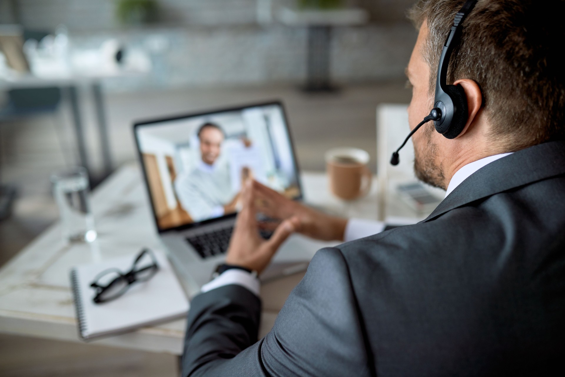Close-up of a businessman making video call from his office.
